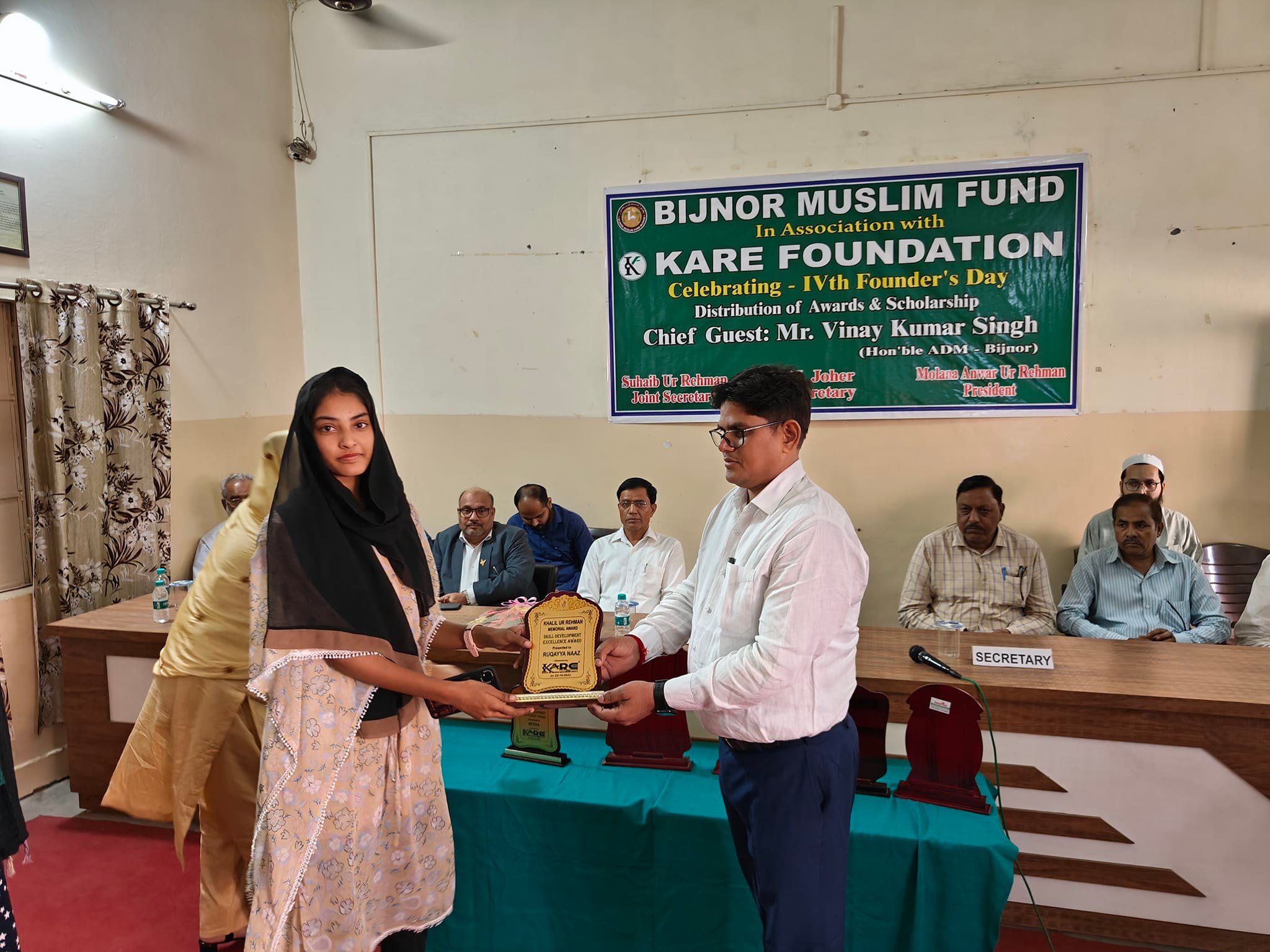 Previous year IVth Founder's Day - Female student receiving scholarship award